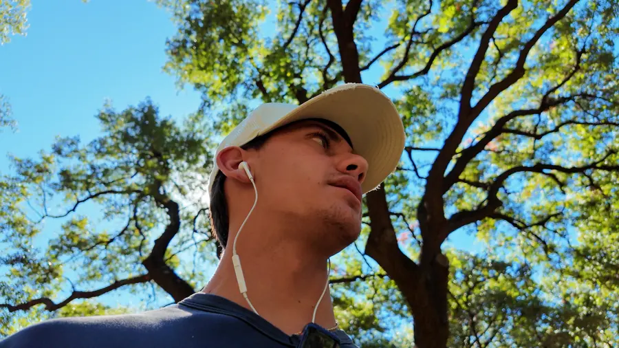 Brennan Harmatz under a tree canopy